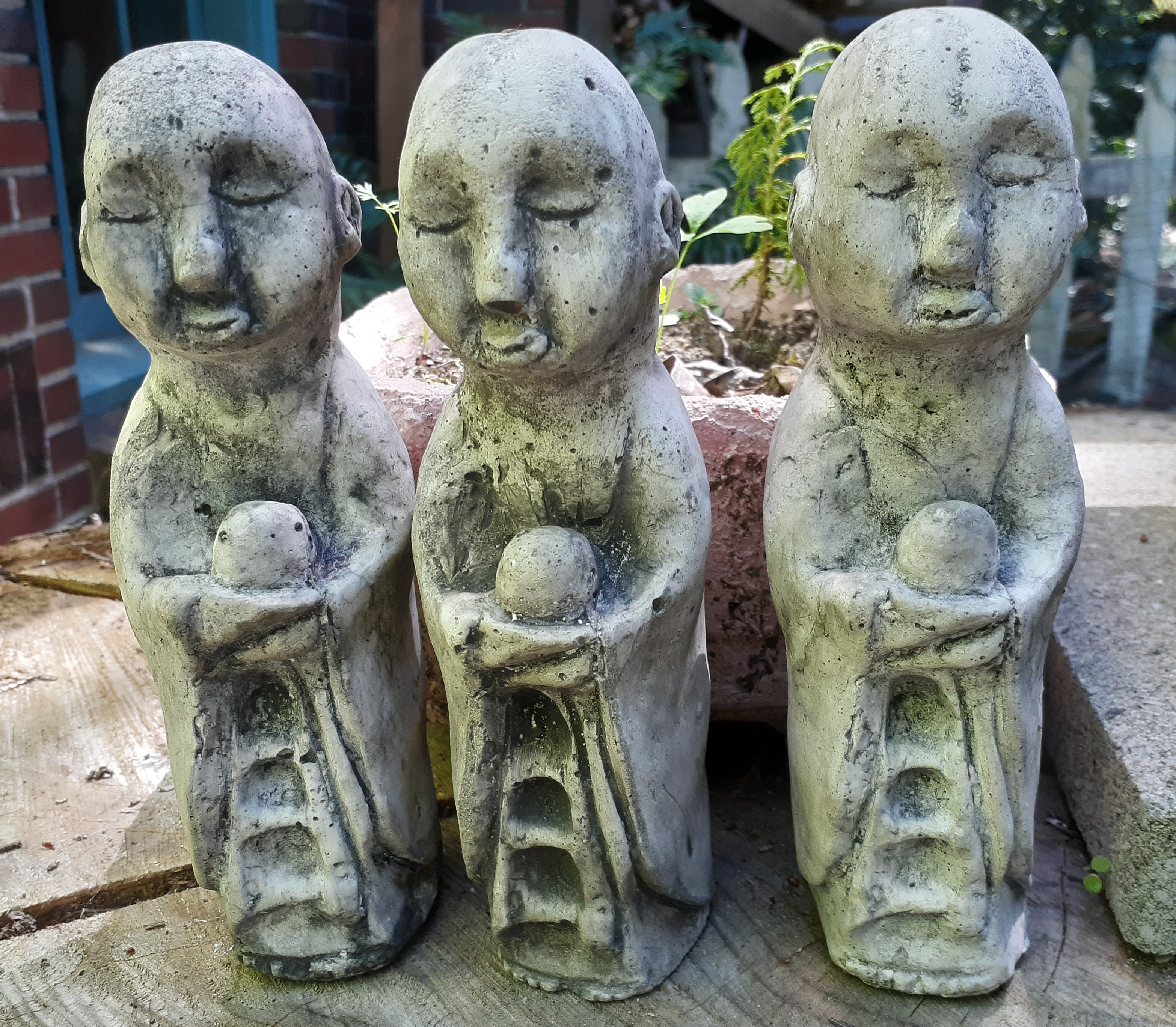Cast concrete jizu statues