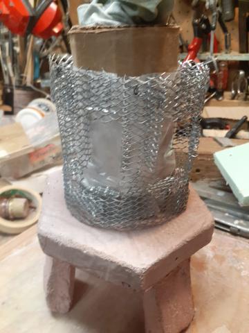 Metal form for mid section of japanese lantern.